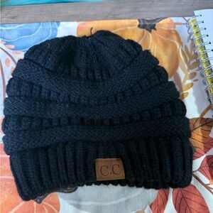 C.C women’s Classic Black Knit Hat with ponytail opening. Great condition! #290
